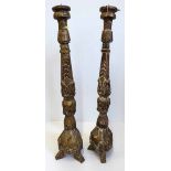 Pair of fireplace candlesticks. No condition reports for this sale.