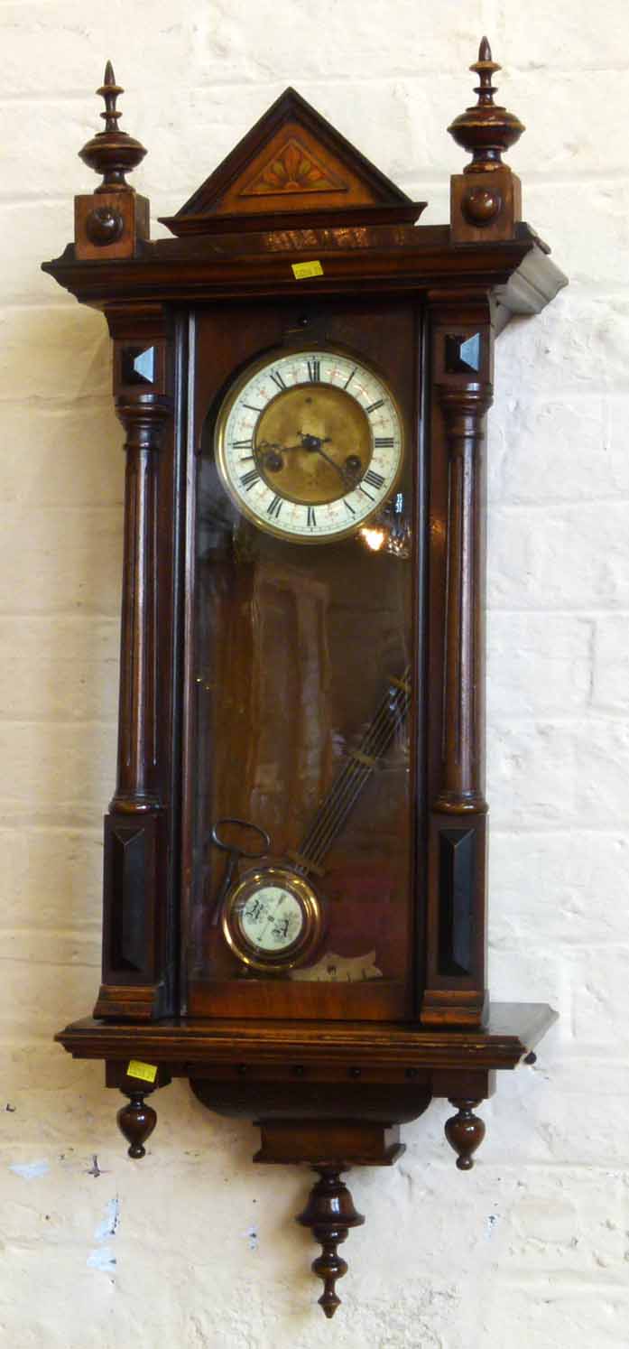 Victorian 8-day wall clock. No condition reports for this sale.