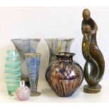 Five art glass vases, an art pottery vase and carved stone figure group No condition reports for