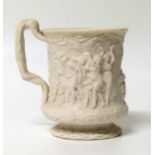 Parian mug decorated with Bacchalanian dancers No condition reports for this lot