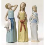 Three Lladro figures of girls No condition reports for this lot