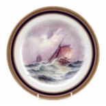 Cauldon plate signed W.E. Dean, painted with two yachts in rough water within blue and acid etched