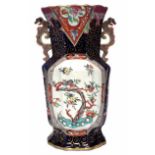 Large Mason's Ironstone vase, with twin dragon handles, decorated with a Chinoiserie landscape