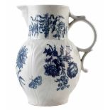 Worcester mask jug circa 1780, printed with natural sprays in underglaze blue, crescent mark to