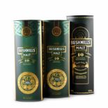 Two bottles of Bushmills 10 year old single malt 700ml and one bottle of Bushmills 10 year single