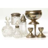 Silver bowl, a pair of candlesticks, spill vase, silver topped box and a bottle, a plated mounted