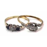 A sapphire and diamond 18ct ring and a 3-stone diamond ring No condition reports for this sale.