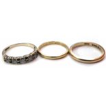 A 5-stone cubic zirconia ring, 9ct wedding band and an 18ct gold band No condition reports for