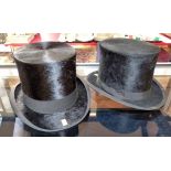 Two top hats (approximate circumference 53cm). No condition reports for this sale.