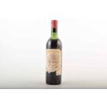 A bottle of Château Pichon-Longueville Baron Chalet de Pauillac, 1961, base of neck. No condition