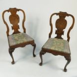 A pair of George I style walnut side chairs,