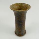 A Ruskin Pottery vase, of trumpet form, decorated in a mottled green crystalline glaze, dated 1930,