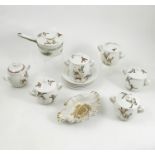 A Porcelaine de Paris France part set, of six covered two handled bowls (one lid replaced),