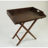 A 19th century mahogany butler's tray, with carrying handle apertures,