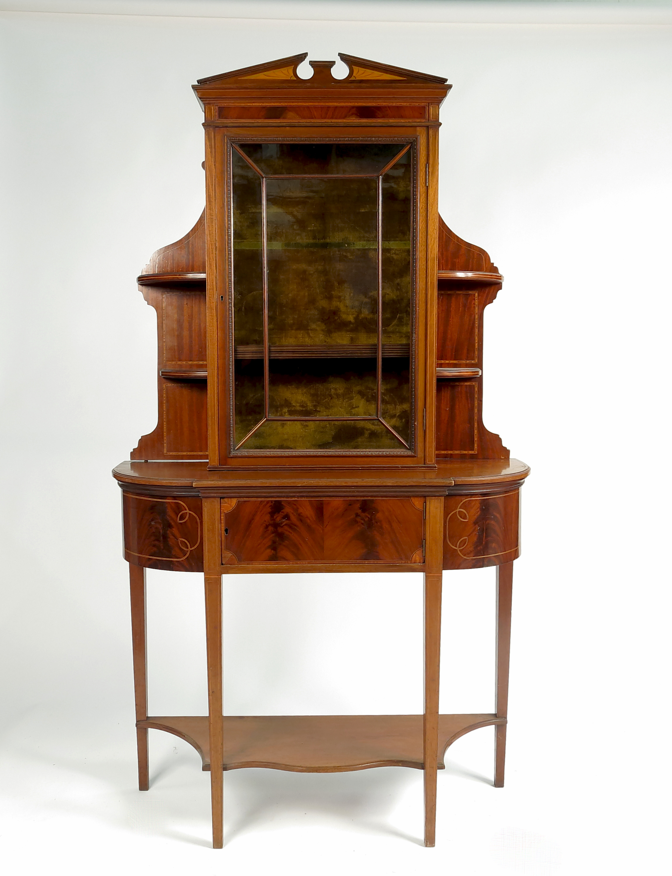 An Edwardian mahogany stand,