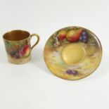 A Royal Worcester coffee can and saucer,