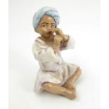 A Royal Worcester figure, India, modelled by F G Doughty, model number 3071,