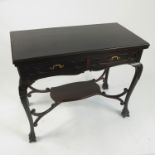 An Edwardian mahogany rectangular fold over games table,