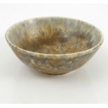 A Ruskin pottery bowl, decorated in a mottled crystalline glaze,