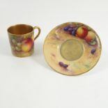 A Royal Worcester coffee can and saucer,