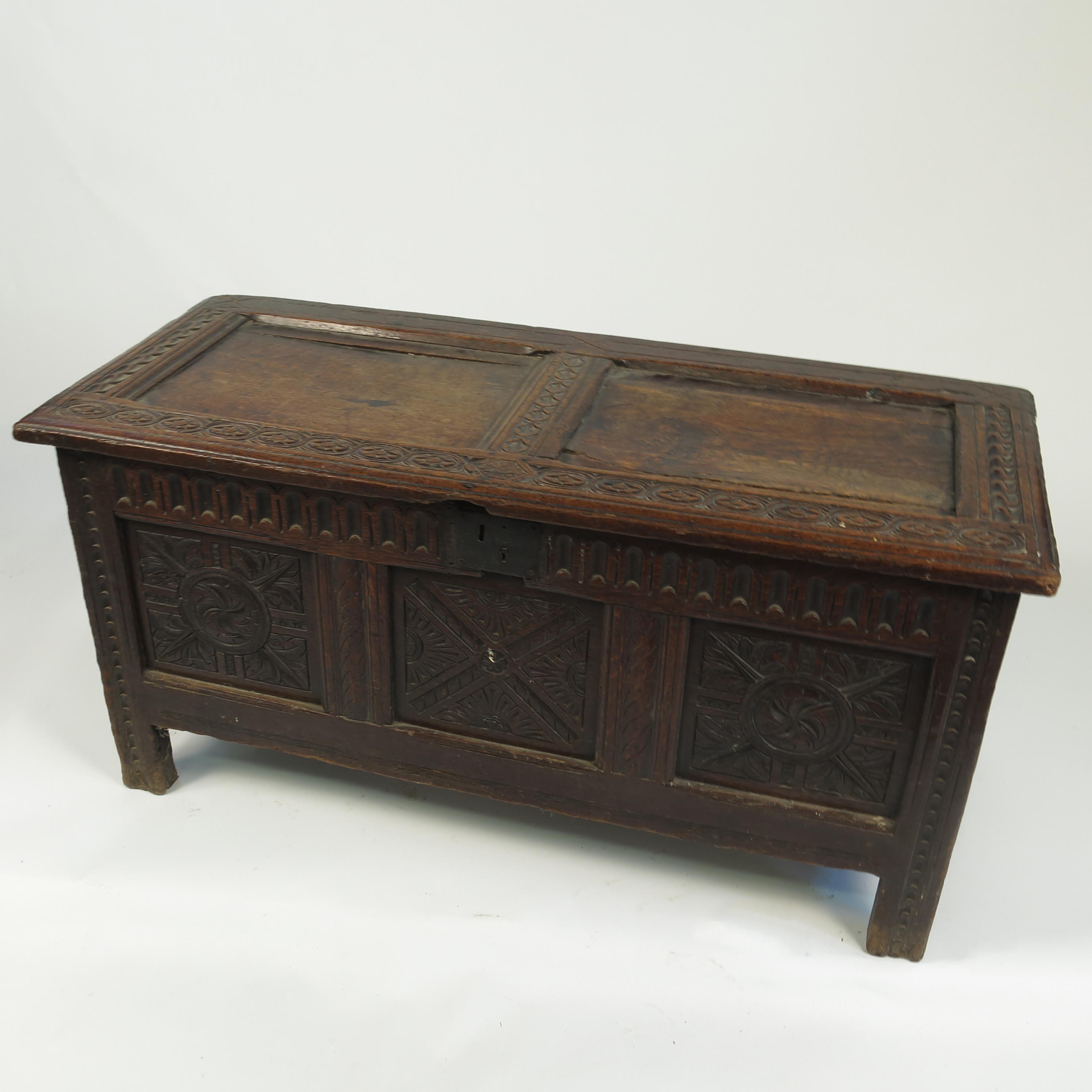 An 18th century oak coffer,