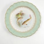 A Royal Worcester plate, decorated trout, to a green border with shaped edge, dated 1902,