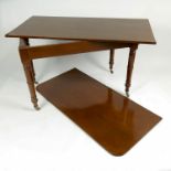 A 19th century mahogany extending dining table,