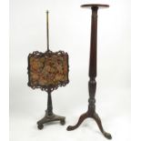 A mahogany jardiniere stand, with reeded column raised on a tripod base,