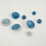 A set of four Ruskin pottery buttons, of circular form with blue glaze, diameter 1ins,