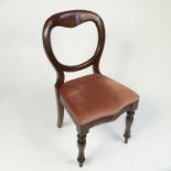 A set of eight Victorian style dining chairs with kidney shaped back,