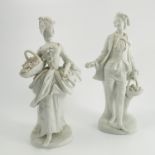 Two parian figures, of a lady and gentleman gathering fruit and flowers,