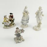 A pair of Continental porcelain figures, of a gentleman and lady,