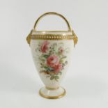 A Royal Worcester basket, decorated with floral spray to front and back,