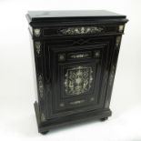 A 19th century North German style ebonised pier cabinet,