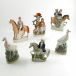 A group of Staffordshire flat back figures, to include Tom King, a jockey on horse back,