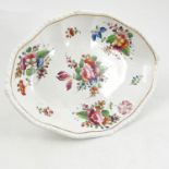 A 19th century Derby porcelain oval dish, decorated with floral sprays to a shaped edge,