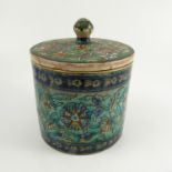 An Iznik style pottery covered barrel, of cylindrical form,