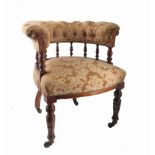 A late 19th century horseshoe shaped galleried back tub chair,