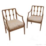 A pair of Georgian style painted armchairs, with three slender splats to the back,