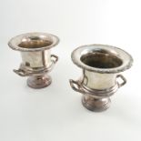A pair of silver plated campana shaped wine coolers, with embossed edge, height 9.
