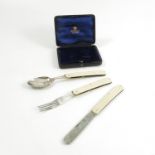 A cased set of 19th century silver plated and ivory handled folding cutlery, comprising a spoon,