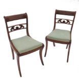 A pair of Regency style mahogany single chairs,