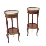 A pair of circular pot stands,