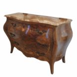 Ensuite to the above, a walnut commode with marble top,