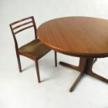 A modern rosewood dining room suite, comprising an extending table, maximum width 88ins,