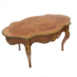 A serpentine shaped centre table,