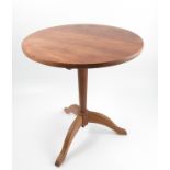 A Cotswold School mahogany tripod table,