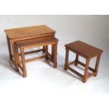 A nest of three rectangular oak tables, by Robert Mouseman Thompson,