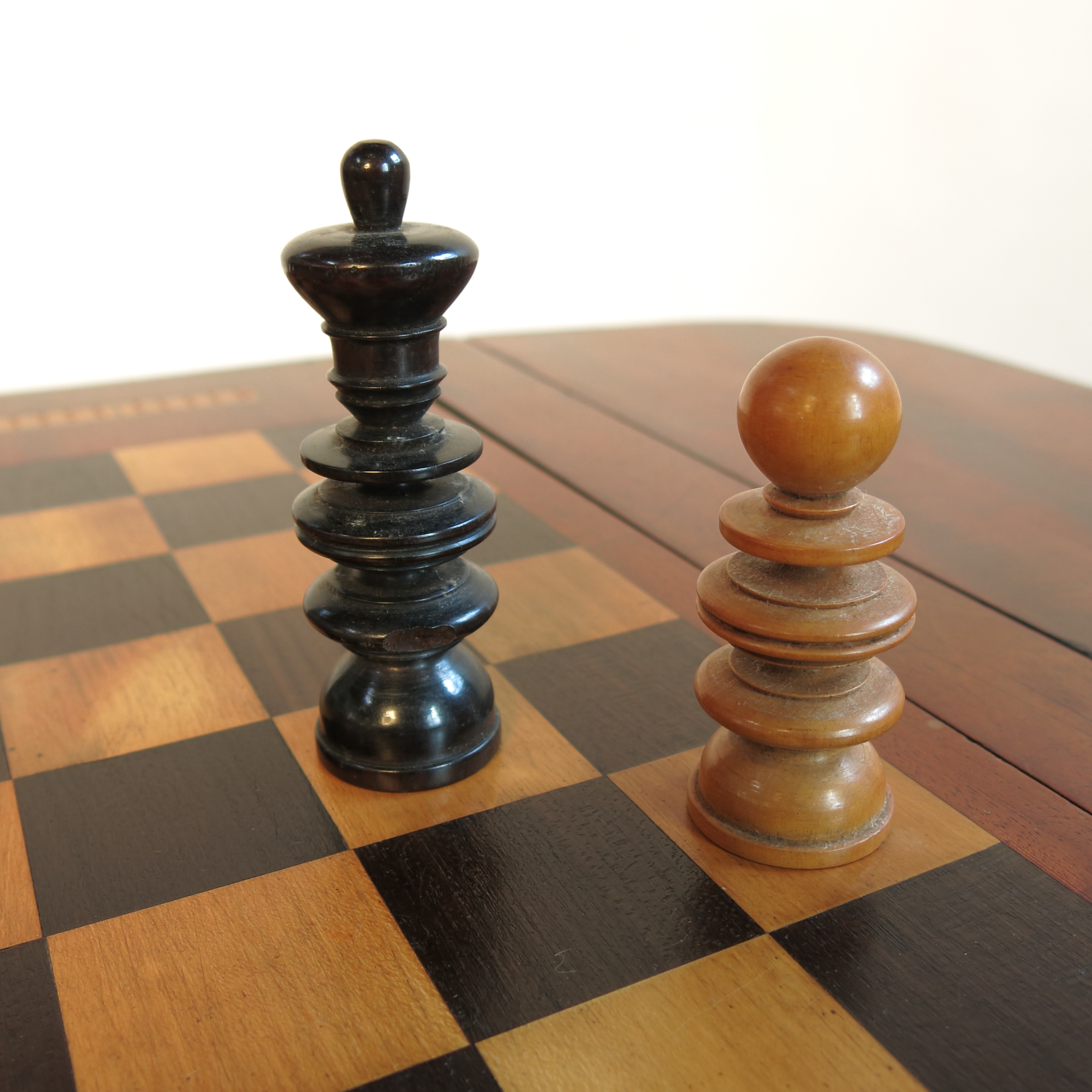 A late Georgian mahogany Pembroke games table, the slide out reversible top with draughts board, - Image 3 of 4