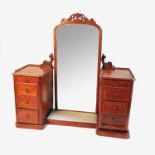 A 19th century mahogany dressing table, fitted with a large central cheval mirror,
